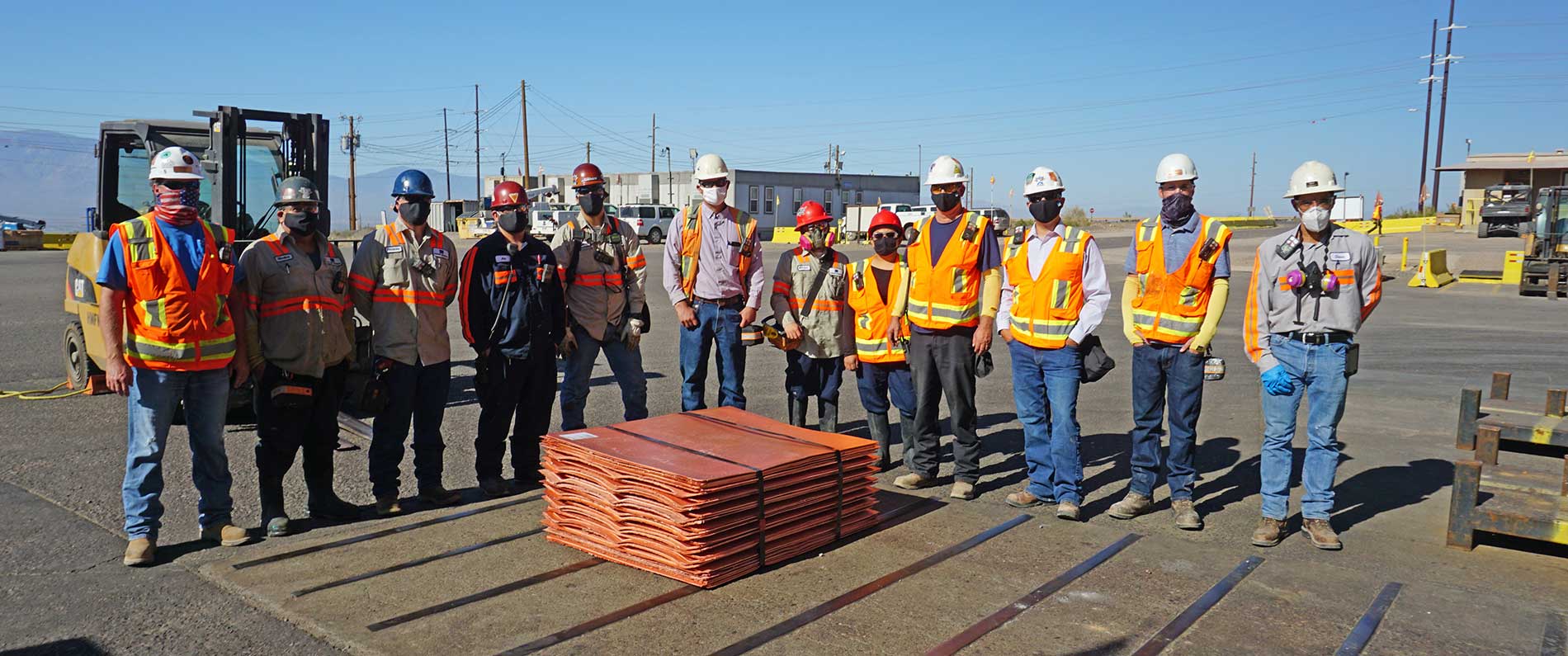 Members of Safford’s Hydromet team surround a stack of freshly bundled copper cathode on September 30, 2020, the day that the site harvested its 2 billionth pound.