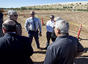 Sahuarita and Green Valley officials talk during the groundbreaking of the Sahuarita Advanced Manufacturing and Technology Center. The 32,000-square-foot building is expected to be completed next summer. Photo Rebecca Sasnett/Arizona Daily Star