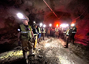 Students from the National Defense University take a production-level tour of the Henderson Underground Mine near Empire, Colo.