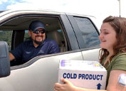 DeVonna Waters took this photo of Ray Gutierrez, Superintendent Maintenance-Shared Services, hand delivering a package of insulin to Dusty Waters after using the access route set up by New Mexico operations during a three-day highway closure.