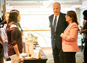 Marcela Hernando, Chile’s Minister of Mining (right), and Francisco Costabal, Vice President-Business Development and Administration, chats with female entrepreneurs at a recent DreamBuilder conference.