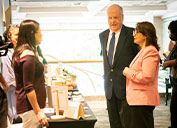 Marcela Hernando, Chile’s Minister of Mining (right), and Francisco Costabal, Vice President-Business Development and Administration, chats with female entrepreneurs at a recent DreamBuilder conference.