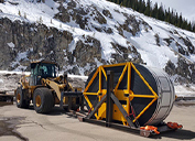 The 8,000-foot conveyor belt was assembled from nine reels of material. 