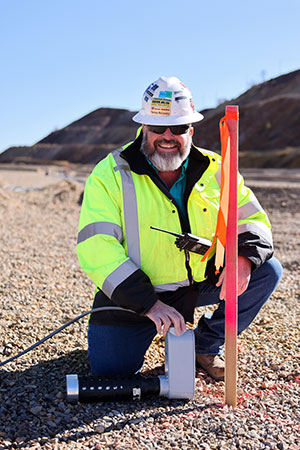 Yancey McCauley shows off an oxygen and temperature sensor, one of the nearly 50 pieces of instrumentation installed. 