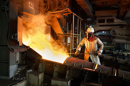 A worker conducts matte tapping at the Manyar smelter in Indonesia before it was put in a state of “hot preservation” with curtailed operations last year. The smelter is planned to resume full operations later this year.