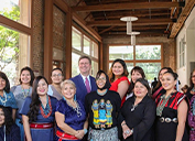 Graduates of Project DreamCatcher pose with U. S. Representative Greg Stanton. DreamCatcher is a partnership between the Freeport-McMoRan Foundation and the Thunderbird School of Global Management. (Photo by Kalle Benallie/Cronkite News)